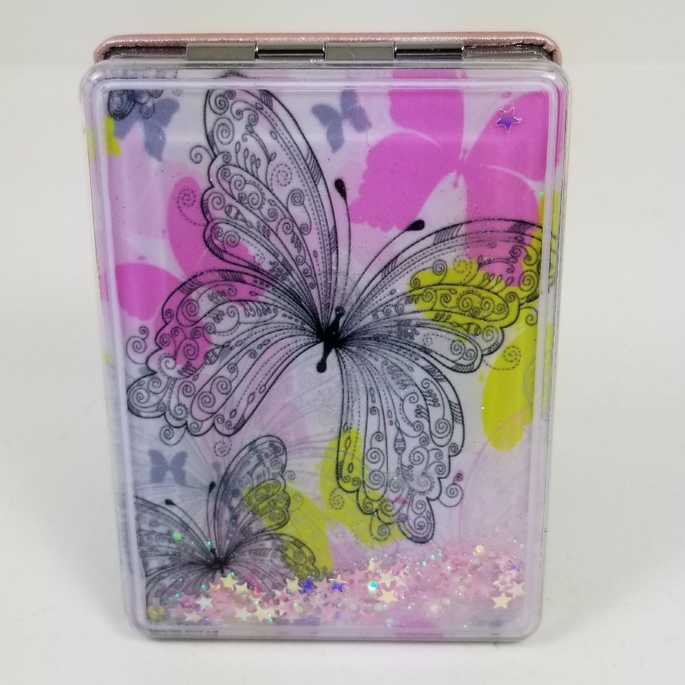 Butterfly snow glove affect floating glitter and stars mirror compact.